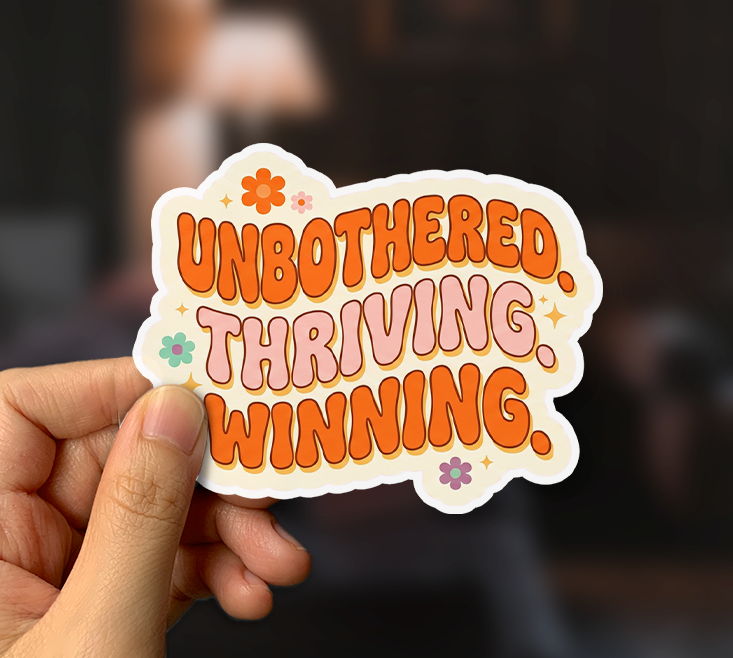 Unbothered Thriving Winning Sticker